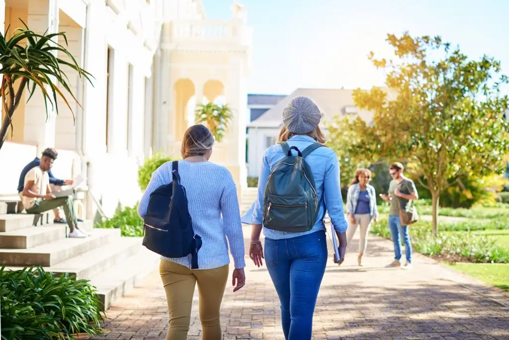 Two students walking around campus